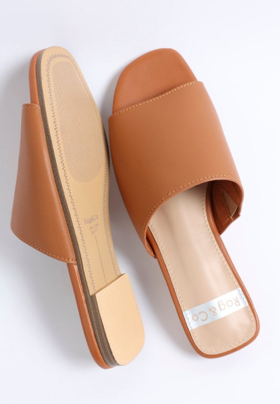 Tan slip-on flats shown from the side and insole, cushioned footbed