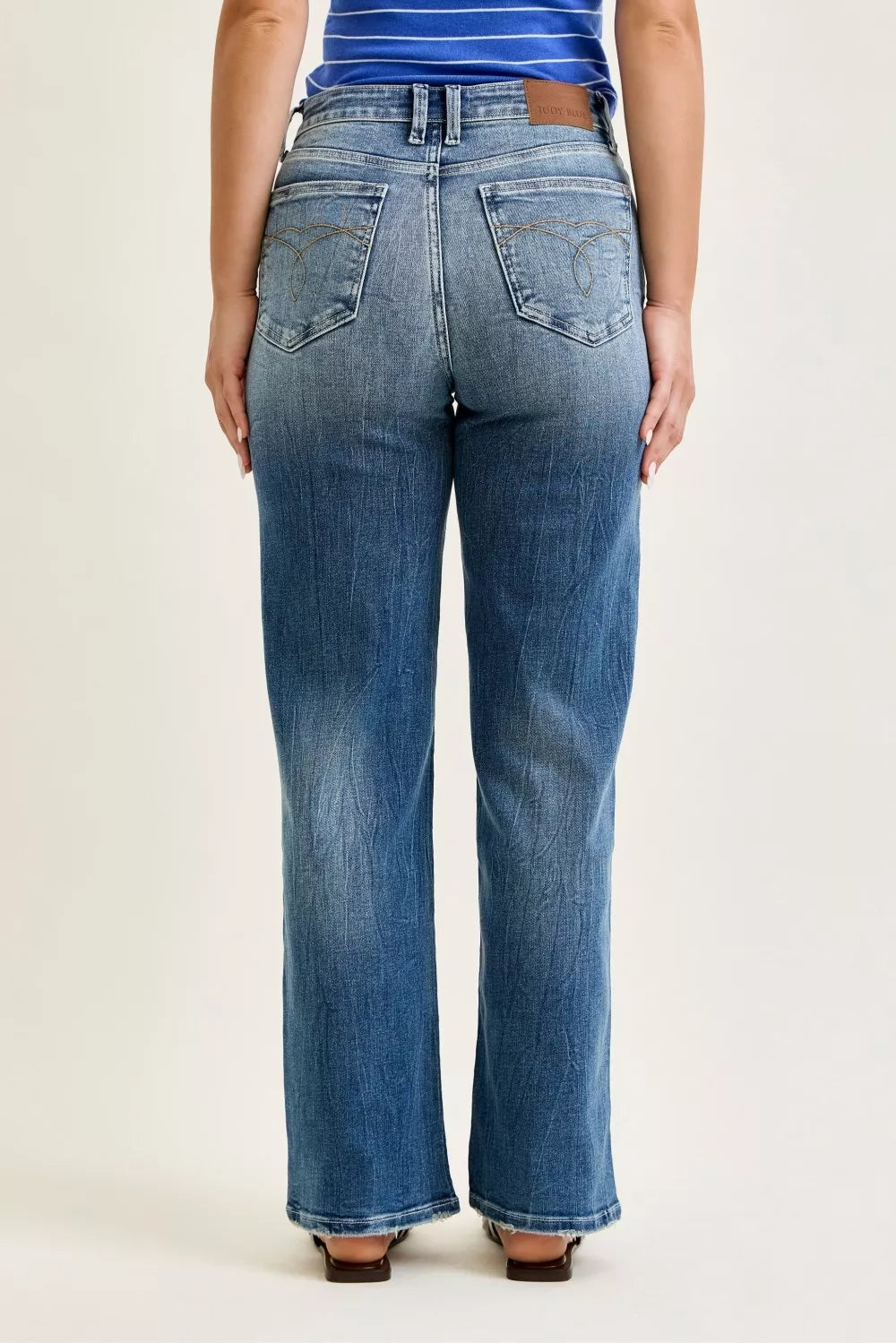 Judy Blue mid-rise 90s straight jeans, medium wash, back view with rear pockets