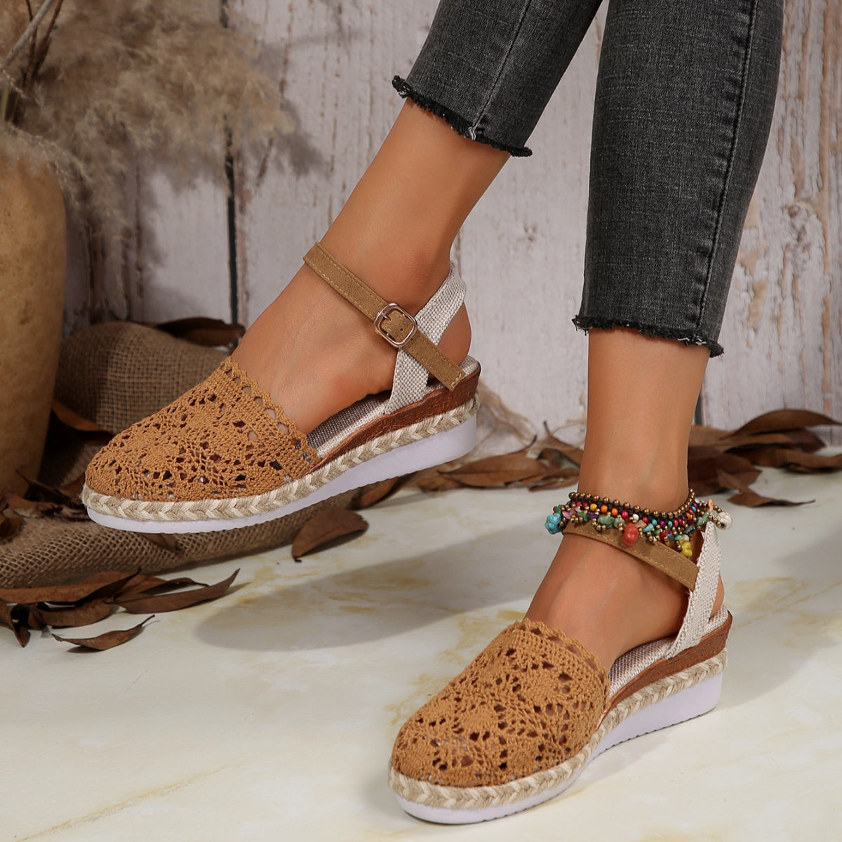 Brown lace-knit espadrille with ankle buckle strap and jute-wrapped midsole