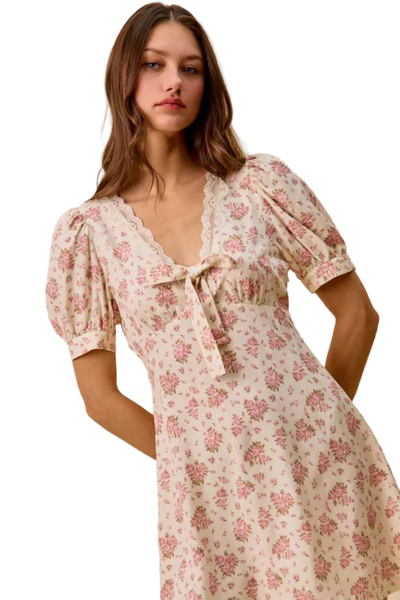 Cream mini dress with pink floral print, lace V-neck trim, puff short sleeves