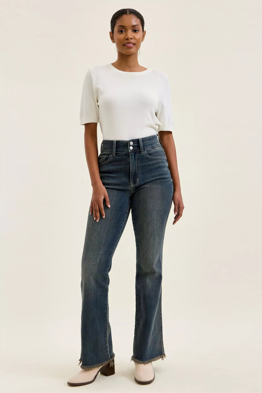 Trendsi high-waist double-button jeans in medium wash denim with frayed hem