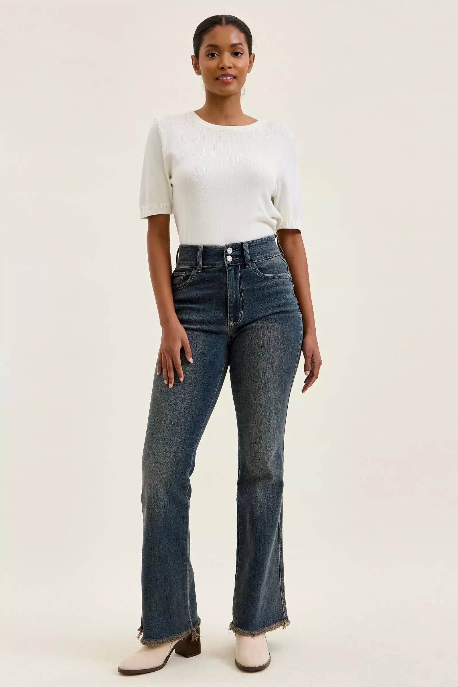 Trendsi high-waist double-button jeans in medium wash denim with frayed hem