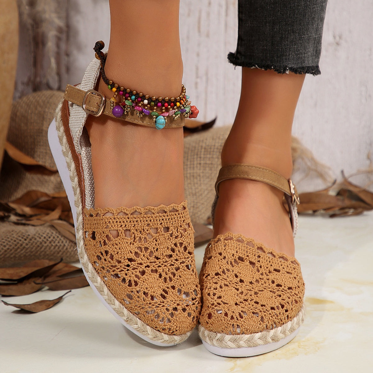 Brown crochet espadrille sandals with ankle strap, jute trim, and white sole