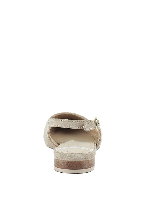 Light beige slingback flats, side and heel view with adjustable buckle strap