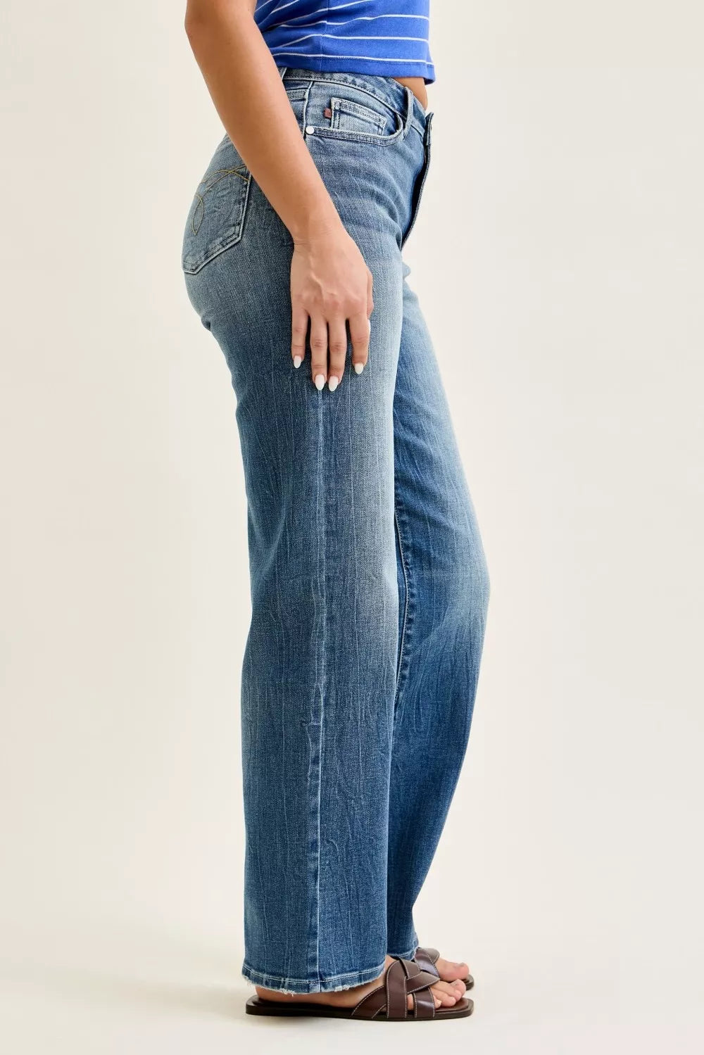 Judy Blue mid-rise 90s straight jeans in medium wash, side view with straight leg