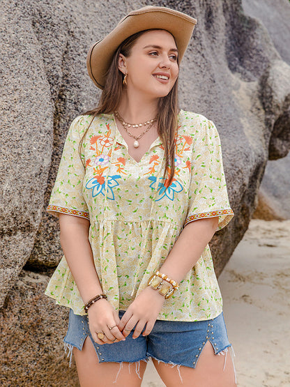 Plus Size Printed Tie Neck Half Sleeve Blouse - Tigbul's Variety Fashion Shop