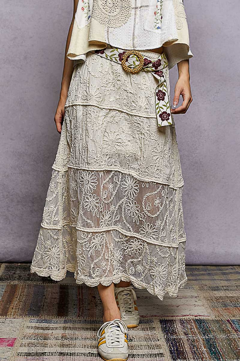 Natural embroidered crochet tiered skirt featuring floral lace appliqué panels