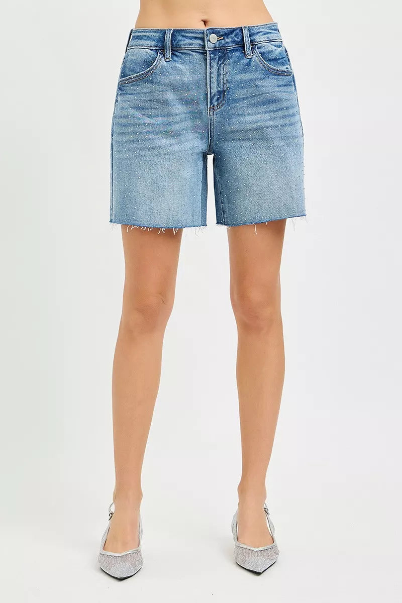 Medium blue denim shorts, rhinestone-studded wash, five-pocket style, frayed hem
