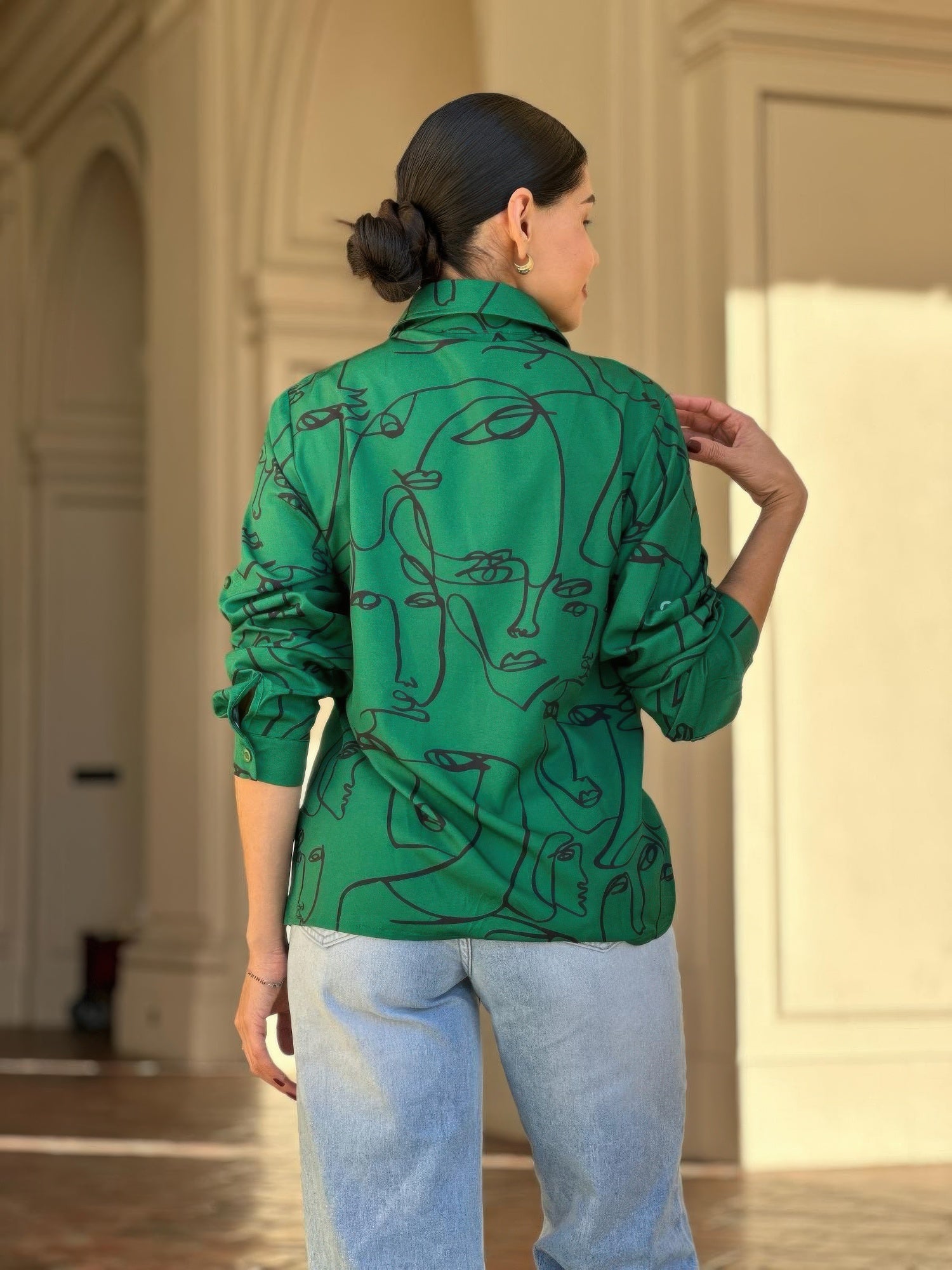 Green face-print button-down blouse back view with full-length sleeves