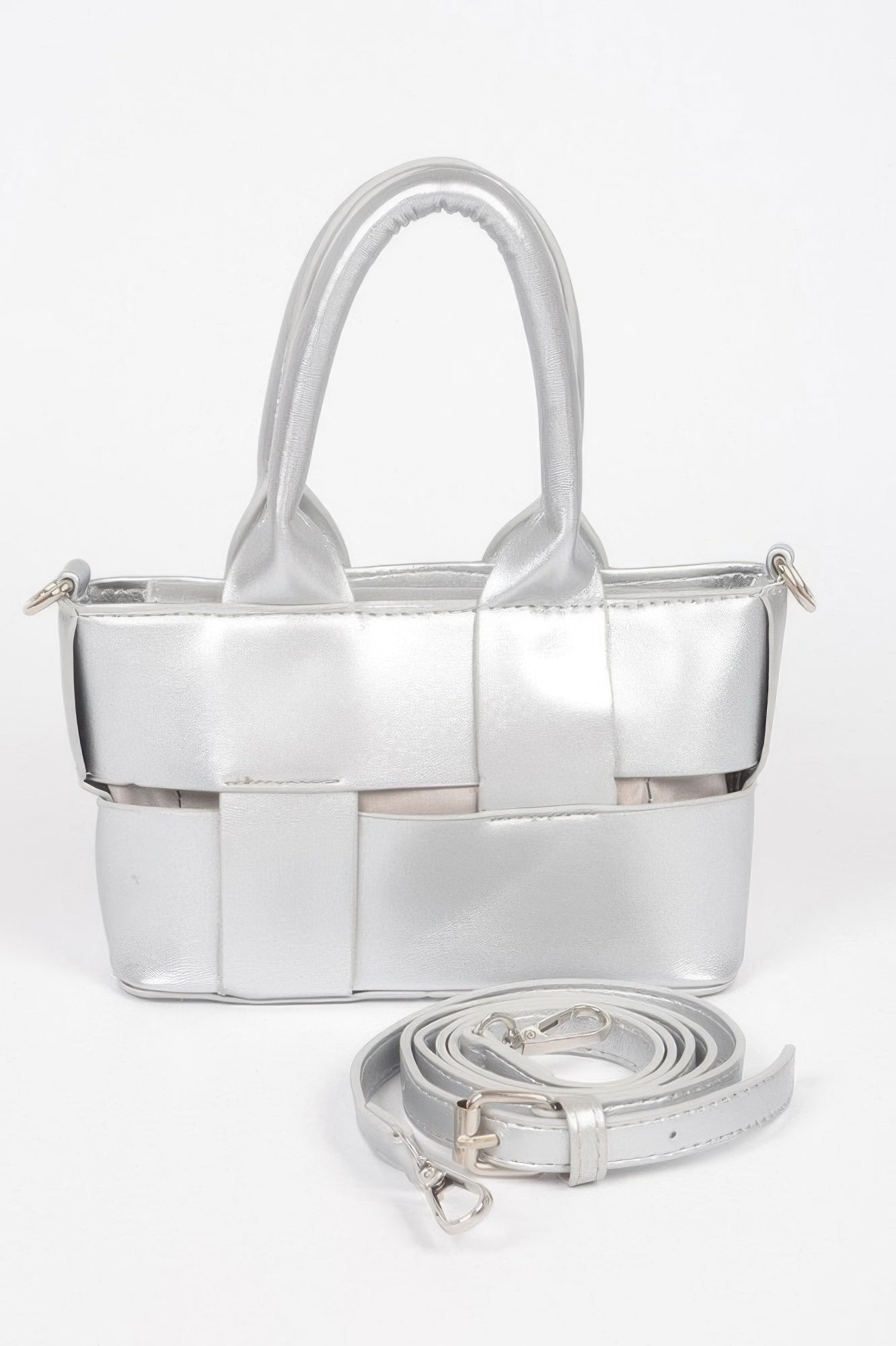 Silver faux leather small tote with braided top handles and matching crossbody strap
