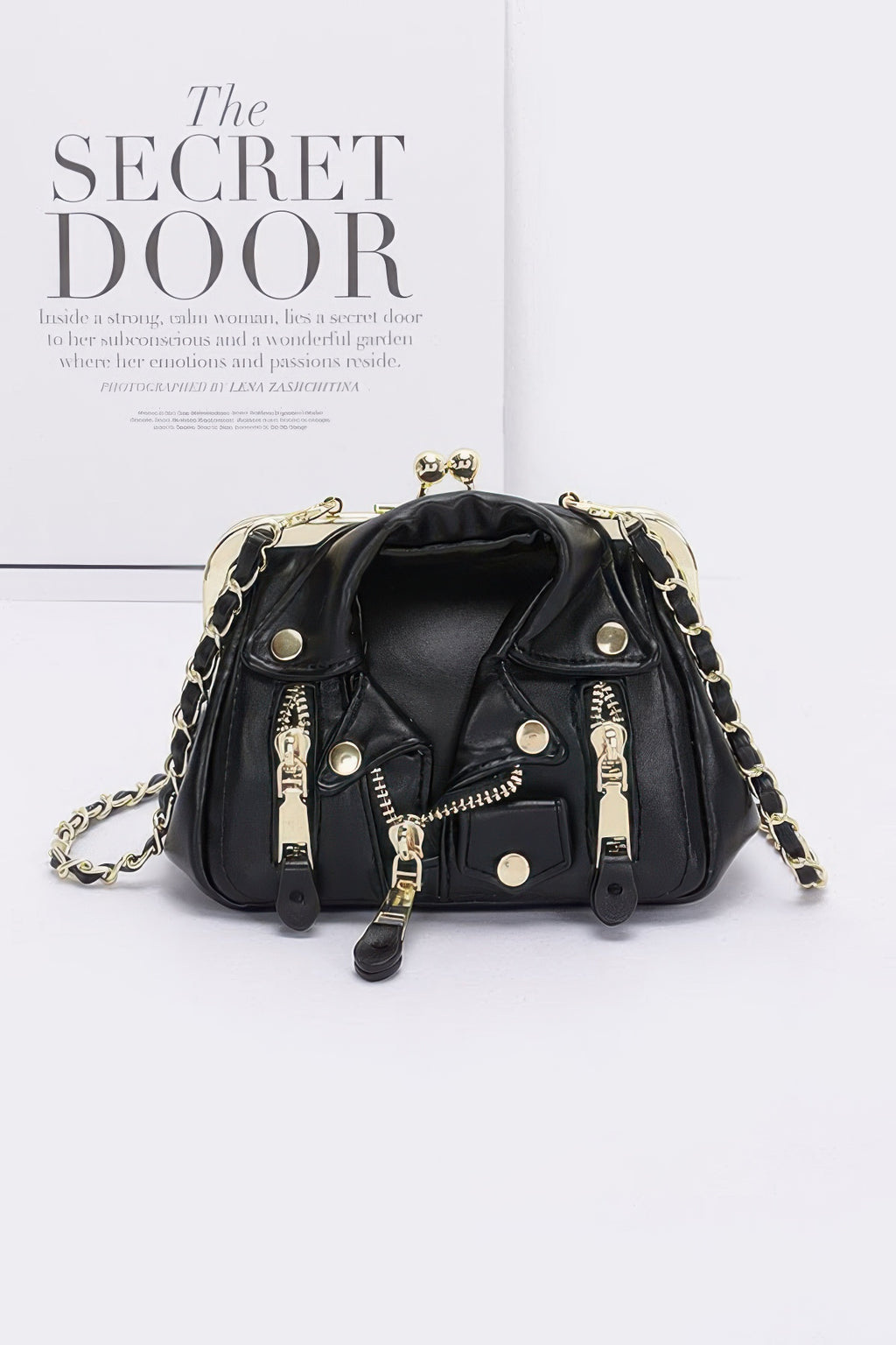 Faux leather crossbody bag, black with gold-tone frame and chain straps