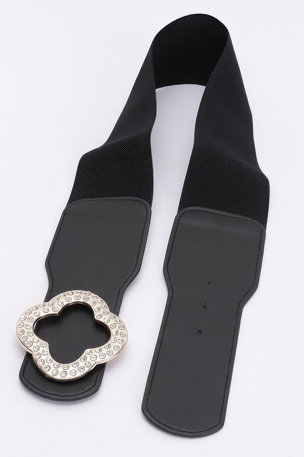 Black faux leather stretch belt with large clover buckle and punched holes