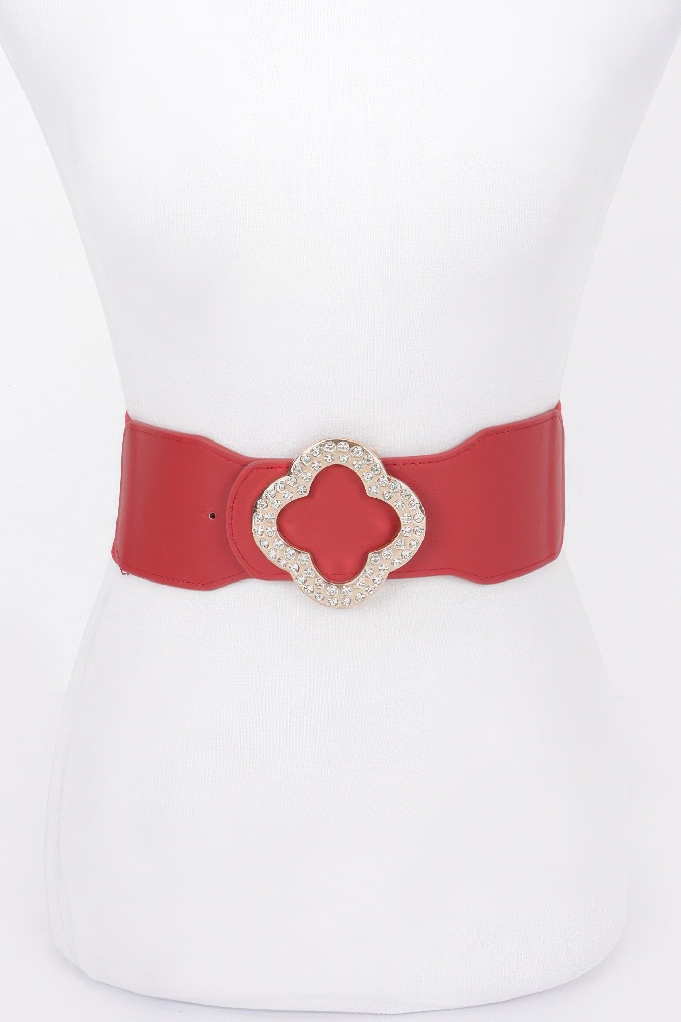 Red faux leather stretch belt with silver-tone rhinestone clover buckle