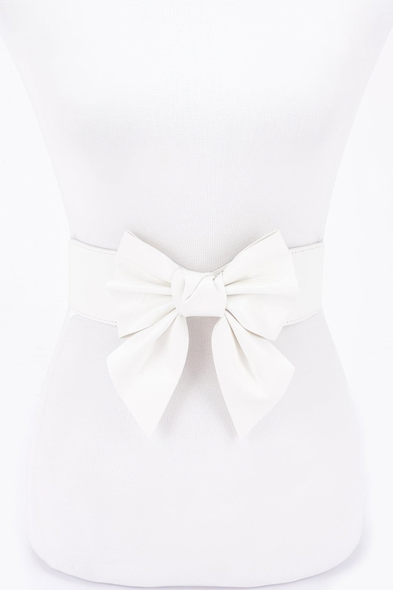 Faux leather elastic belt with white bow at waist