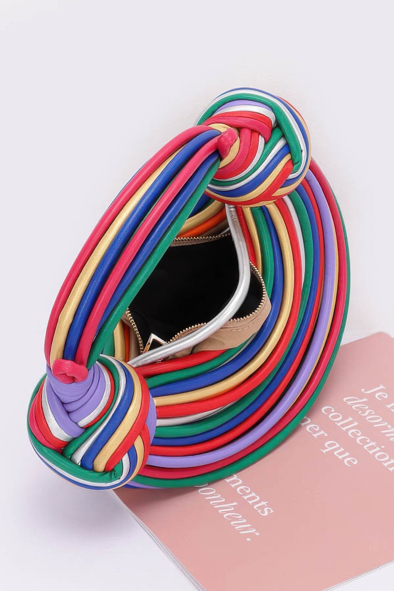 Faux leather rope hobo bag with open top and rainbow rope trim, knotted handle detail