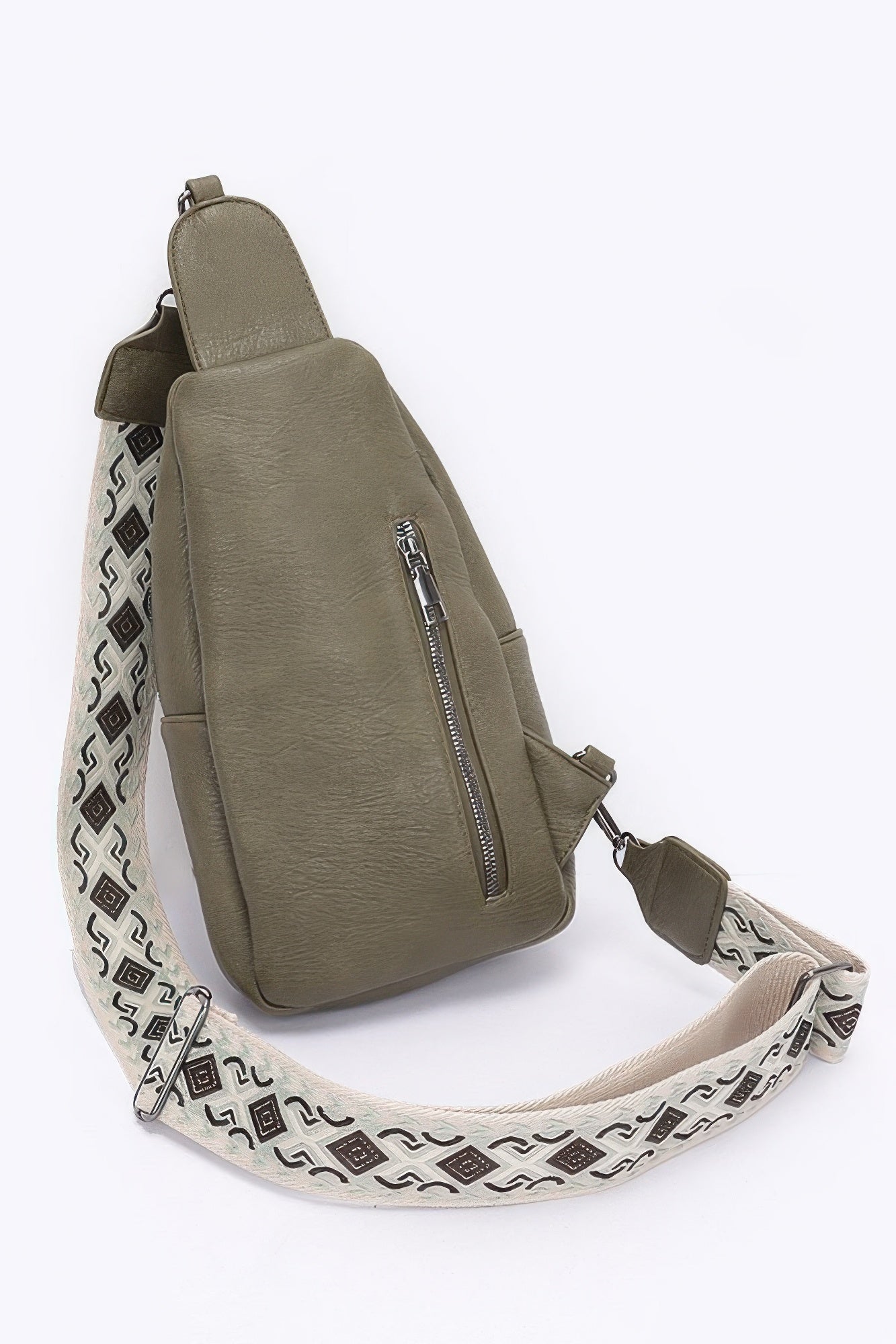 Olive sling bag front view with adjustable strap and patterned multi-color webbing