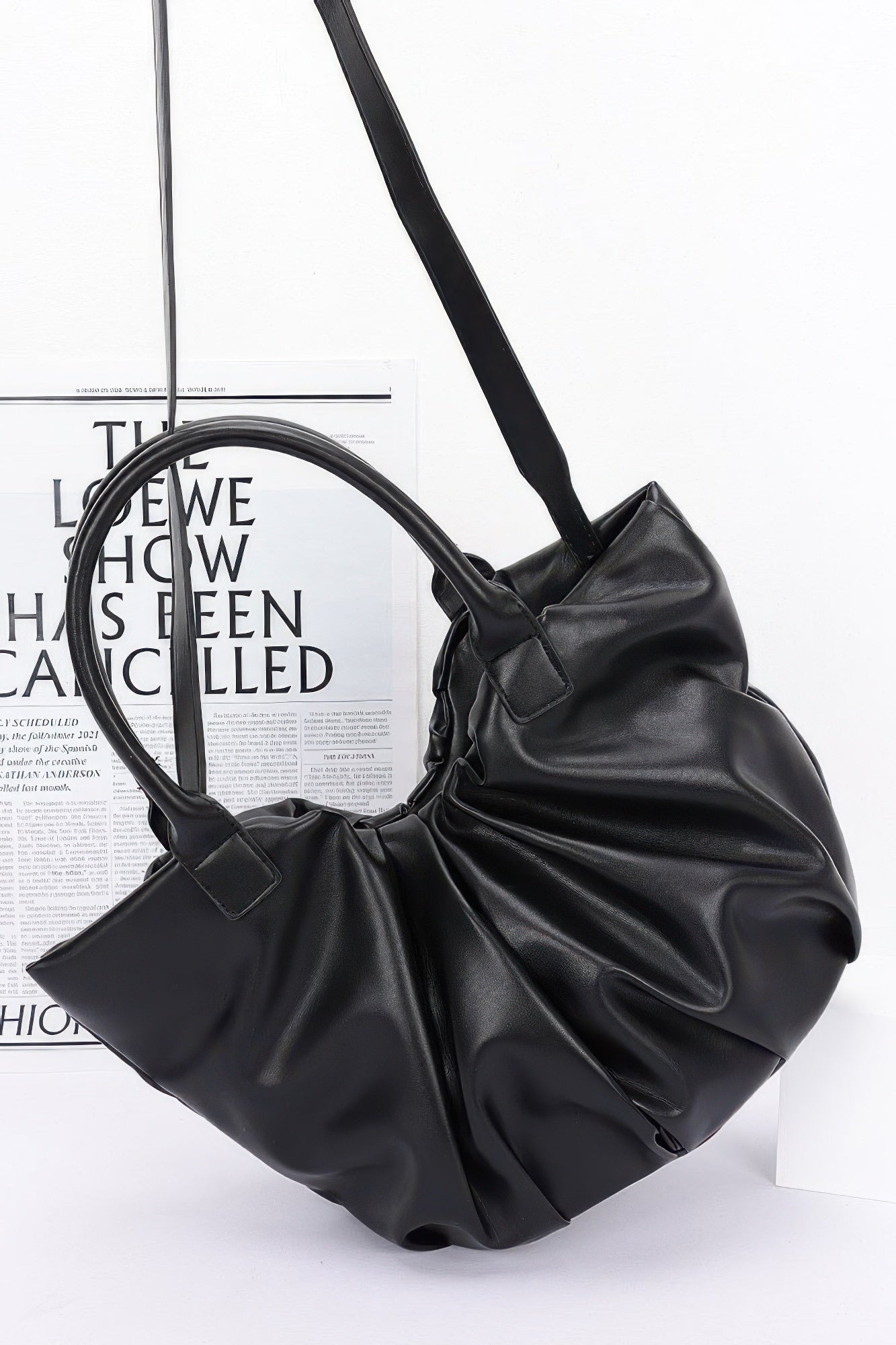 Faux Leather Tote Bag in black with adjustable shoulder strap and gathered body