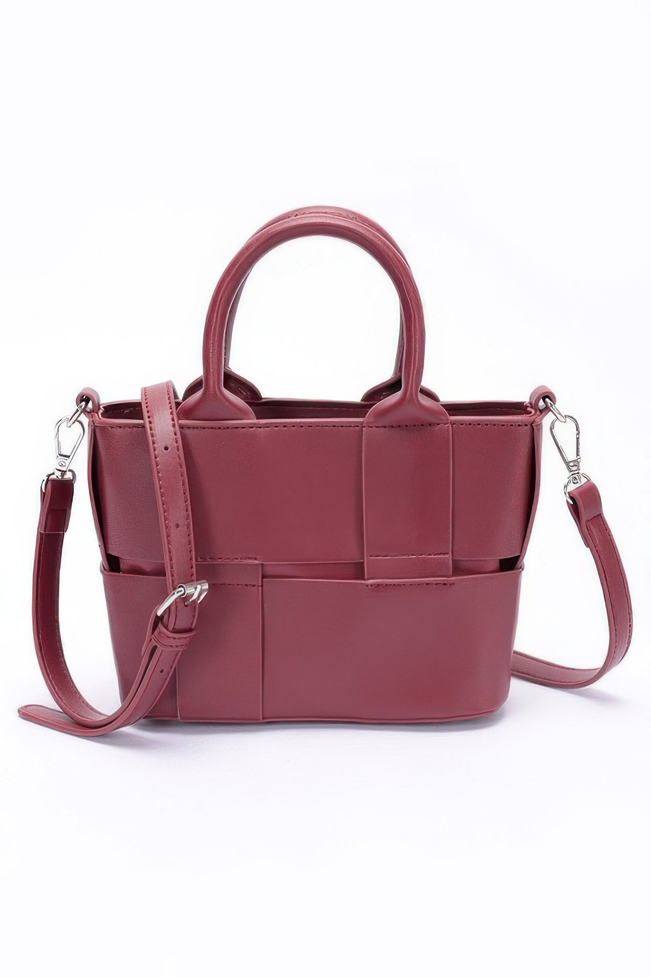 Faux leather tote bag in burgundy, top handles and crossbody strap with metal clips