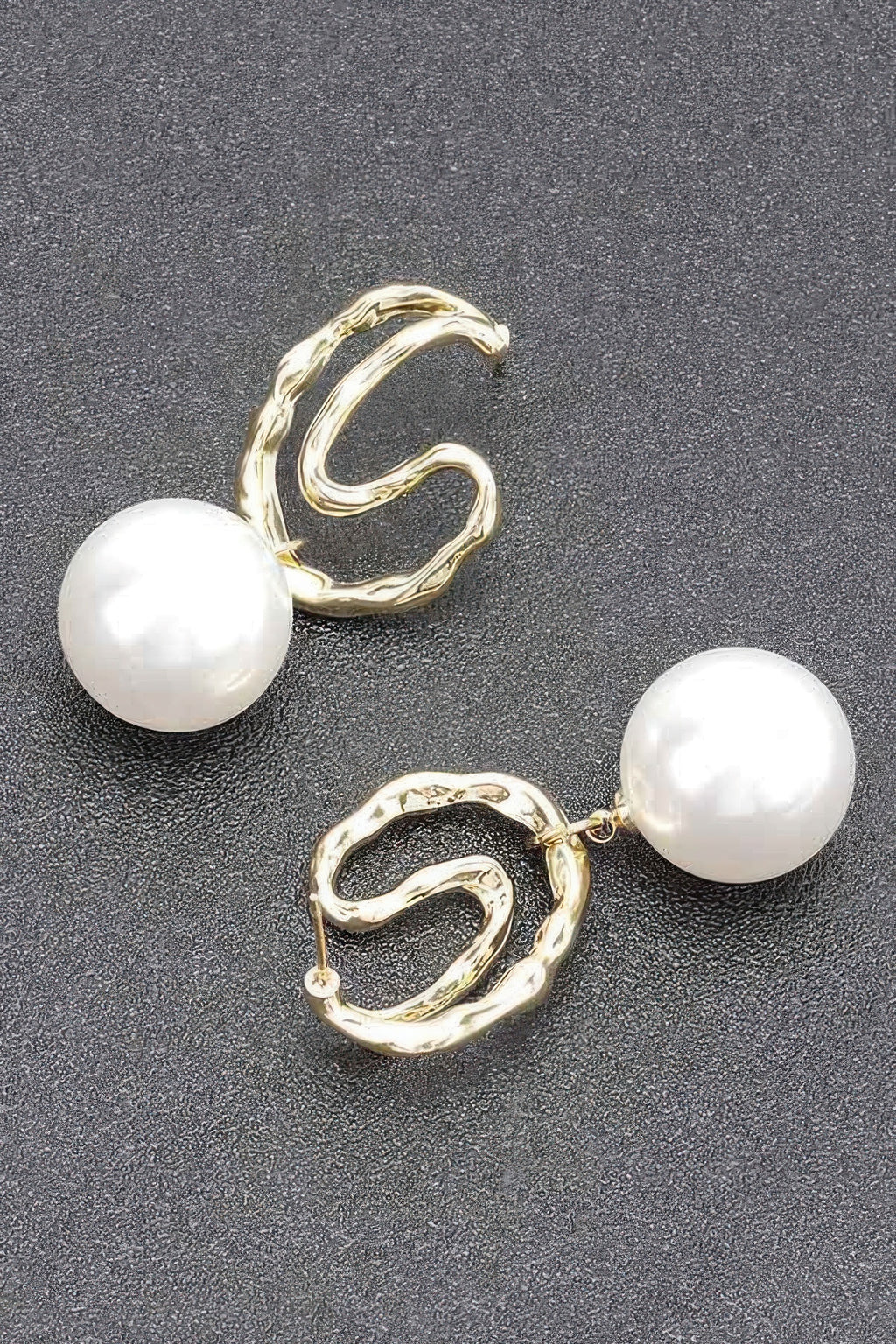 Gold faux pearl drop earrings with textured twisted hoops
