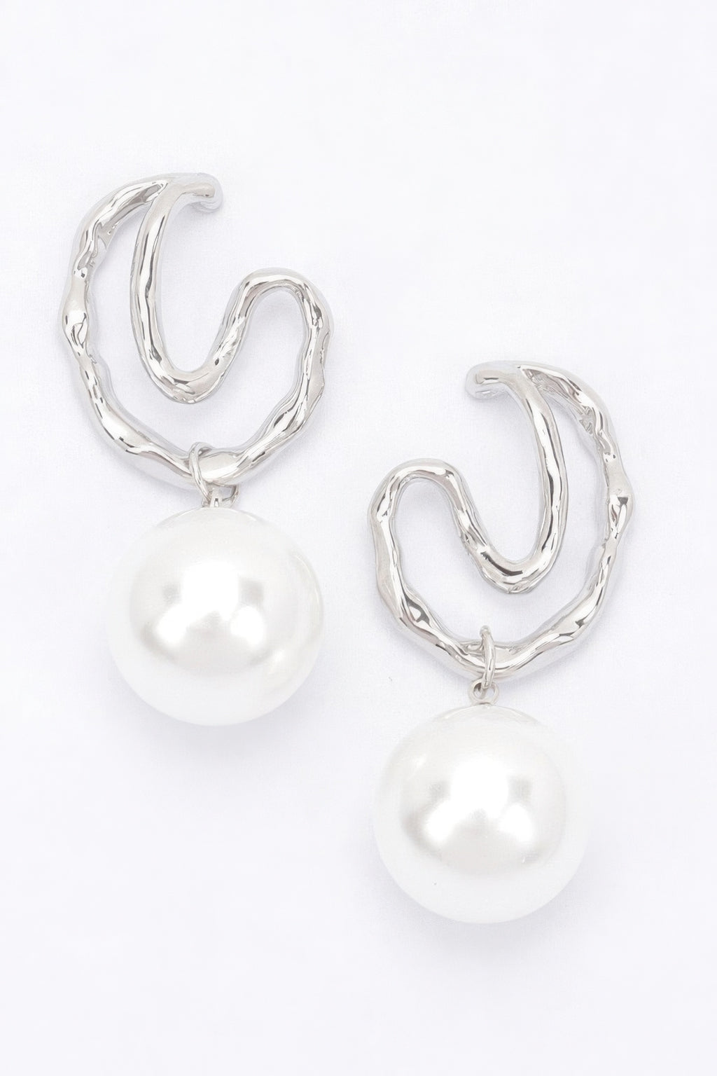 Silver-tone faux pearl drop earrings with twisted hoop design