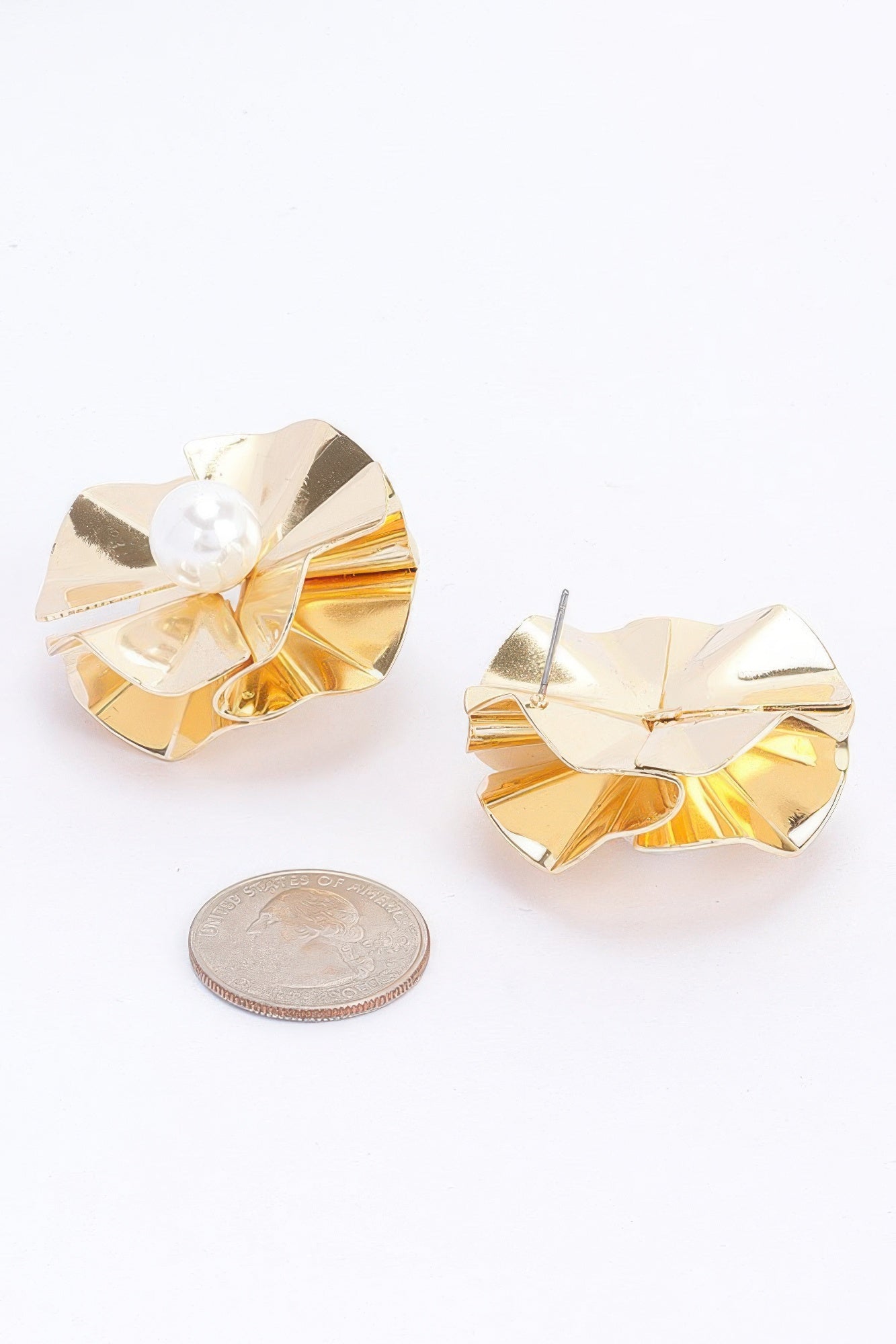 Gold faux pearl button earrings with tiered metallic petals and visible stud backs