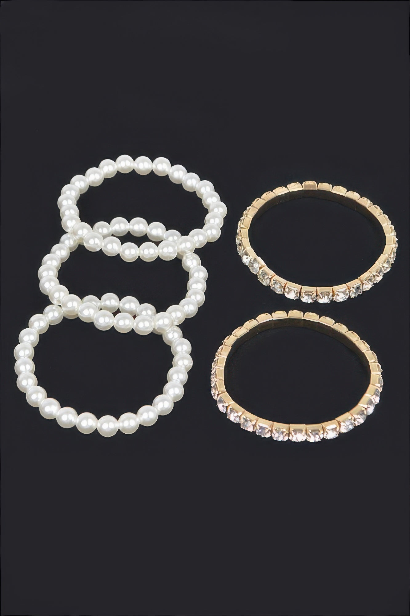 Faux pearl bead bracelet and two gold rhinestone cuff bangles