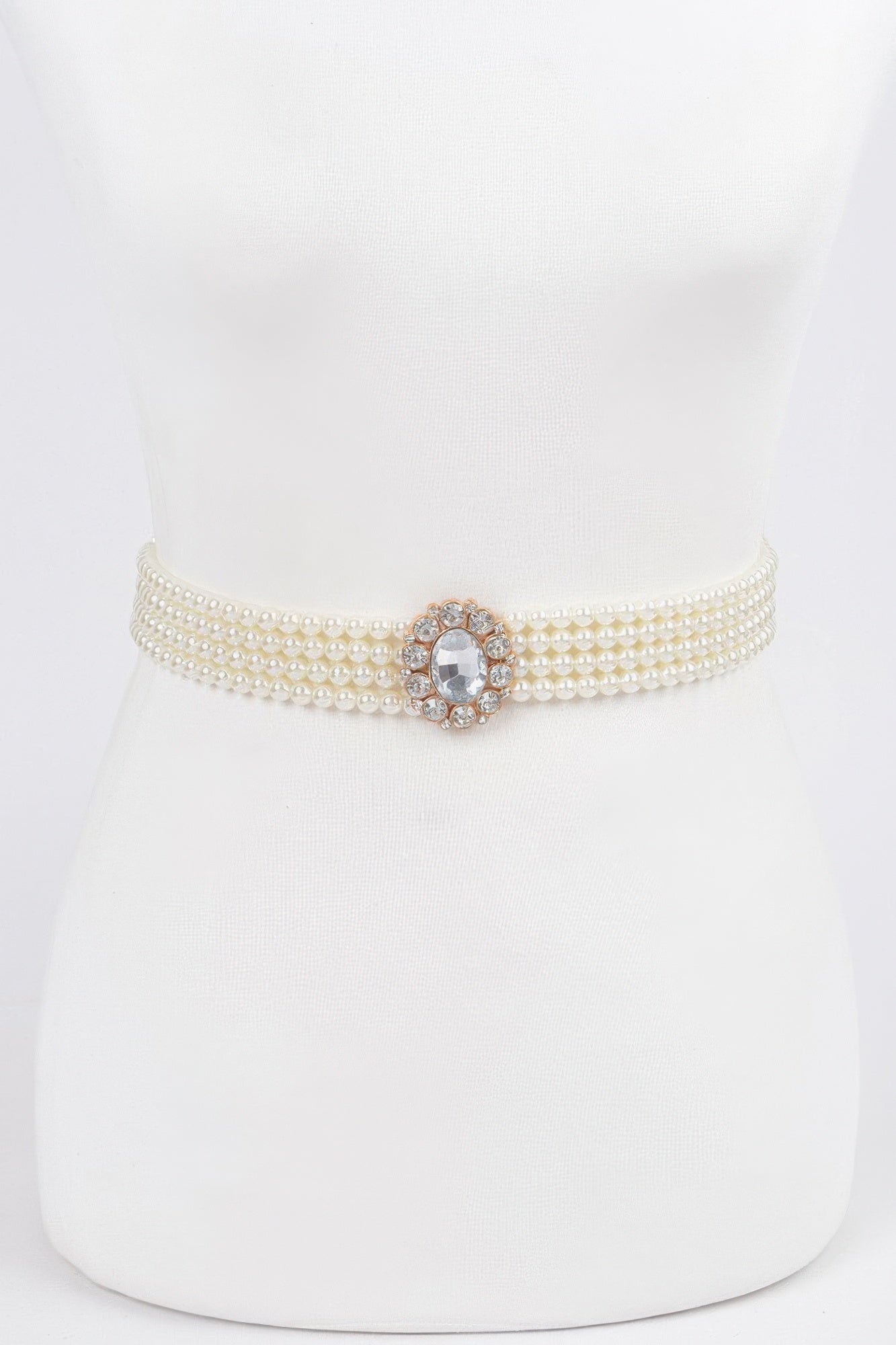 Ivory faux pearl stretch belt with oval rhinestone clasp