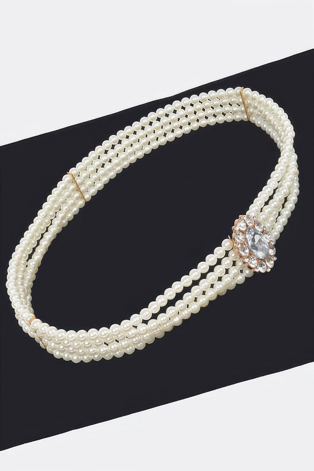 Faux pearl cord belt with rhinestone oval ornament, double-loop design