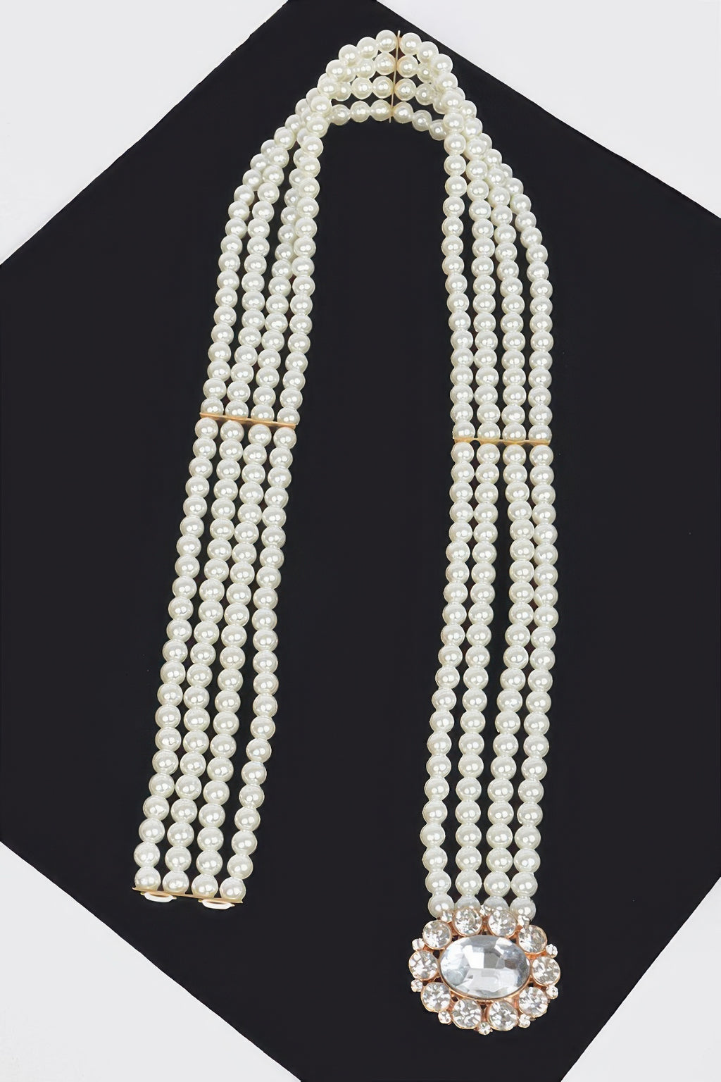 Ivory faux pearl beaded belt with long drape and large oval rhinestone pendant