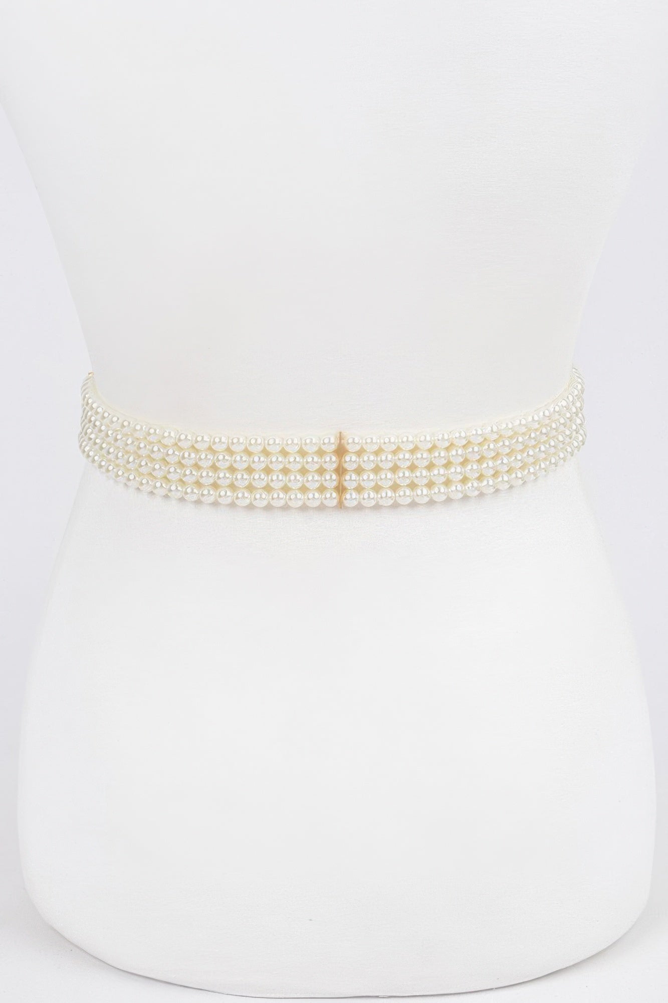 Ivory faux pearl stretch belt, smooth centered clasp detail