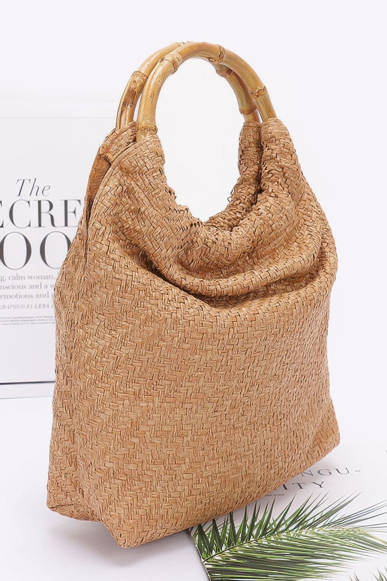 Camel faux straw handbag with woven texture and bamboo top handle