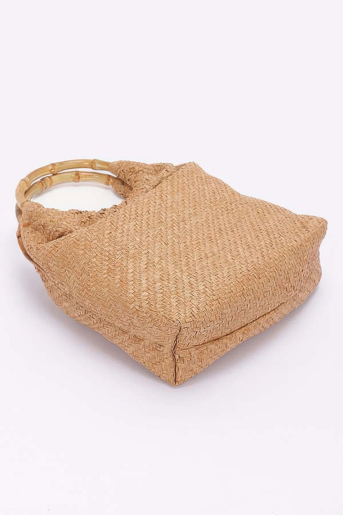 Camel faux straw handbag with bamboo handle, closed top view
