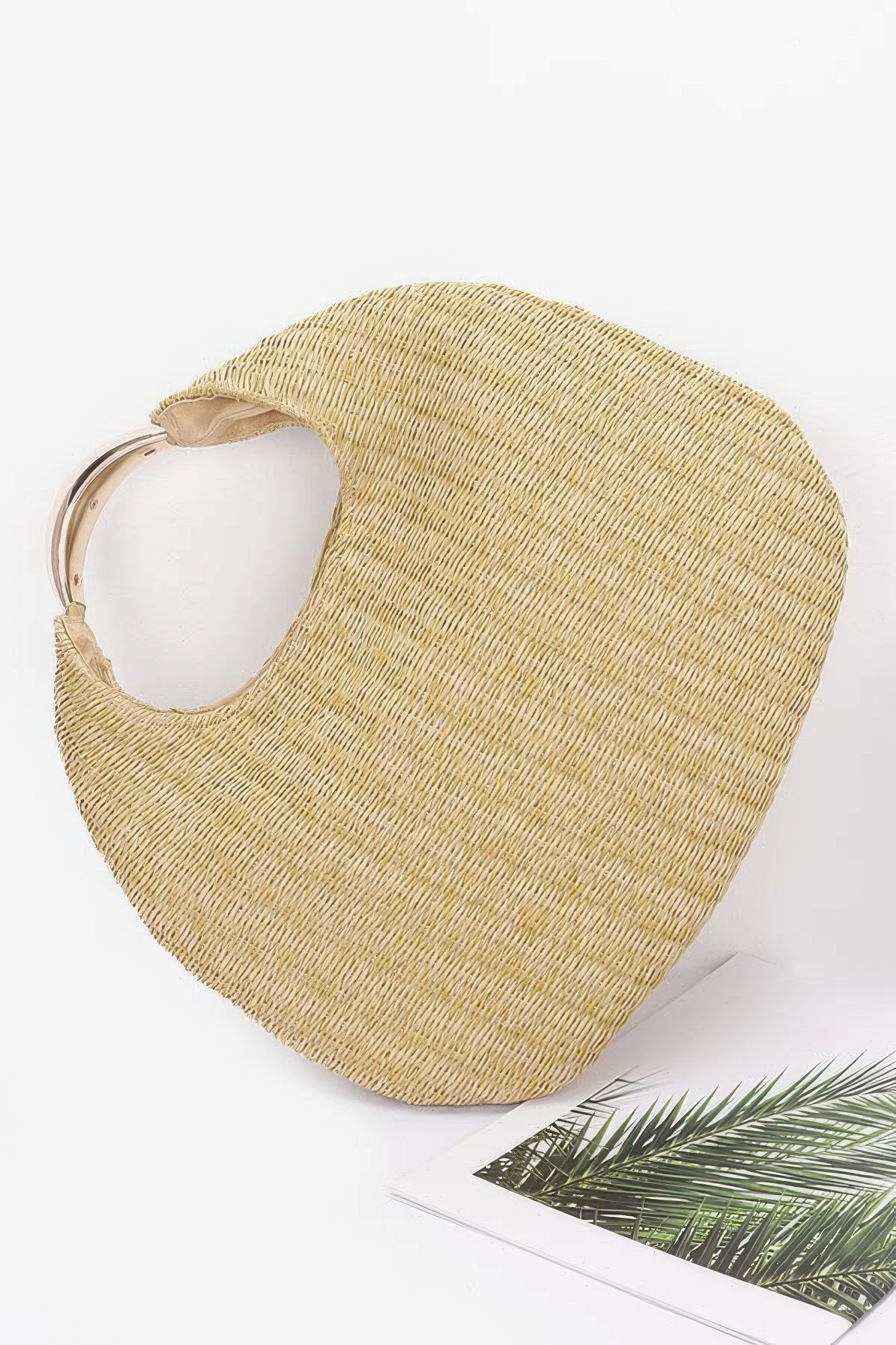 Khaki faux straw hobo bag with metal handle loop and open top