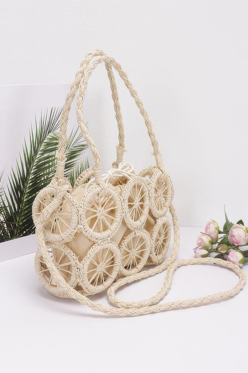 Ivory round handmade crossbody bag with braided strap and wheel crochet pattern