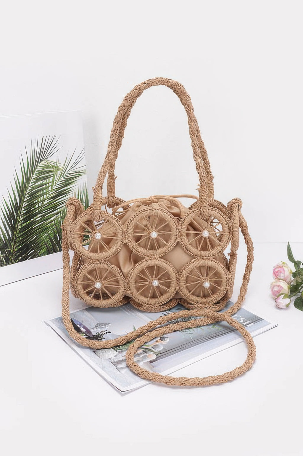 Khaki round handmade crossbody bag with braided crossbody strap and wheel design