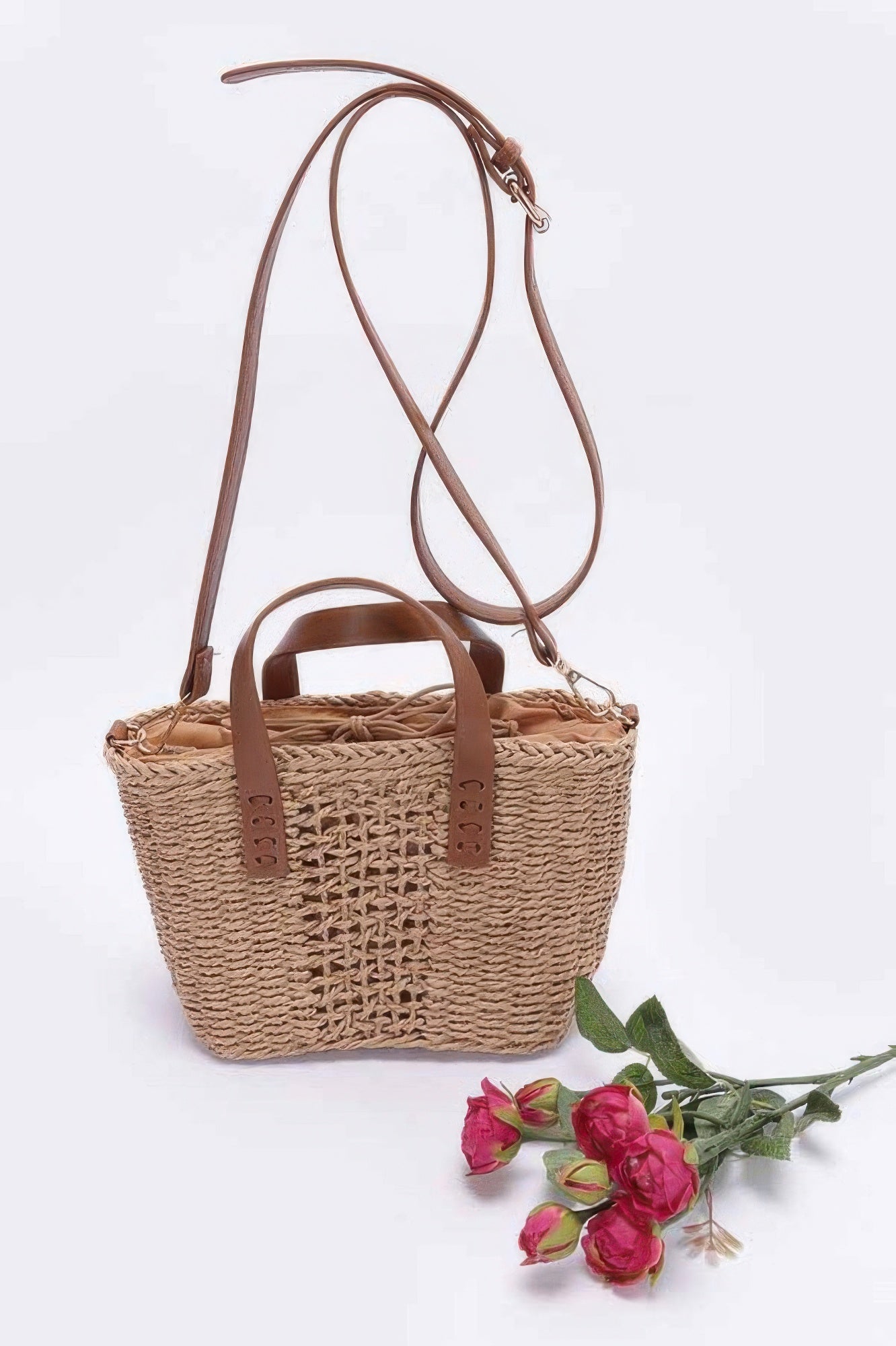 Khaki faux straw small tote with brown leather-look handles and long crossbody strap