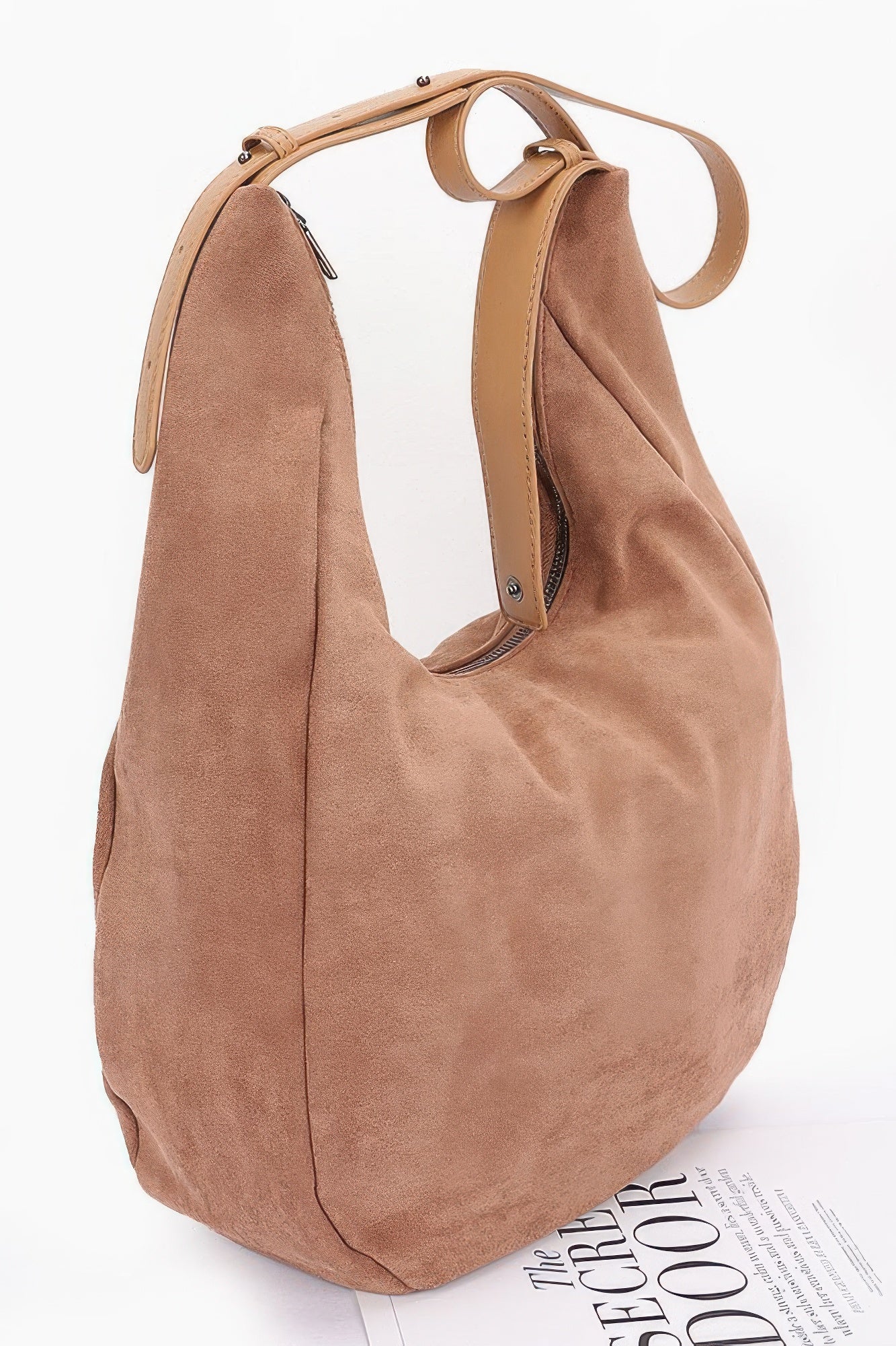 Camel faux suede bindle bag with front seam details and top handle loops