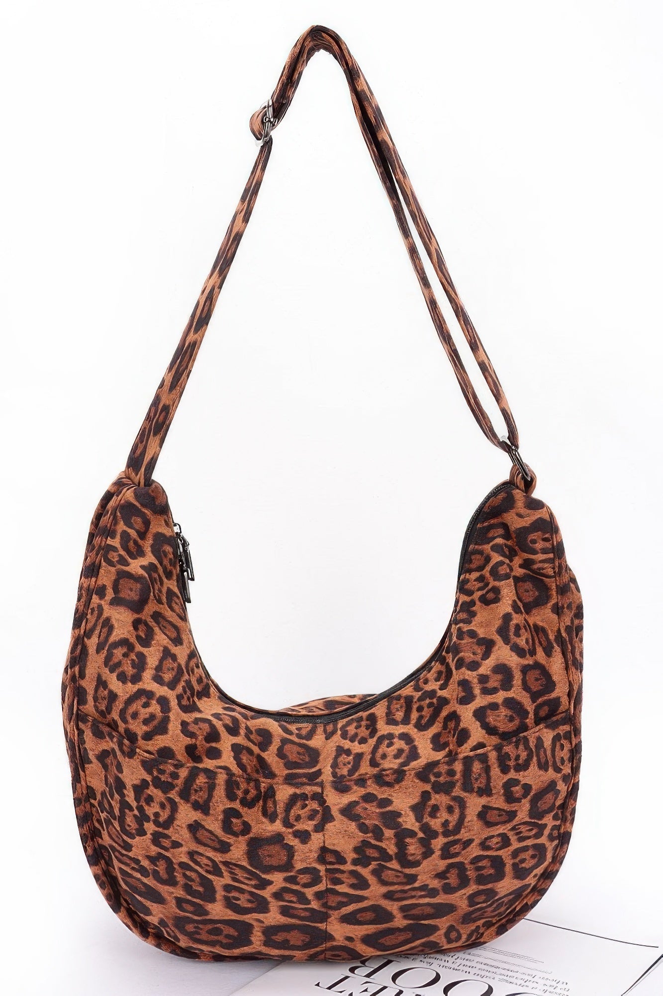 Faux suede leopard crossbody bag with wide double-pocket hobo shape and adjustable strap