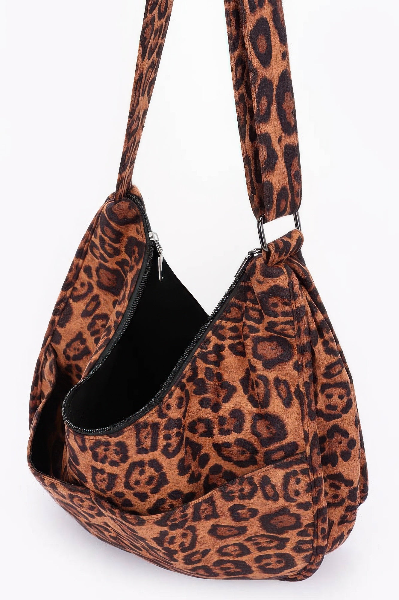 Leopard faux suede crossbody bag with two zip pockets and black inner lining