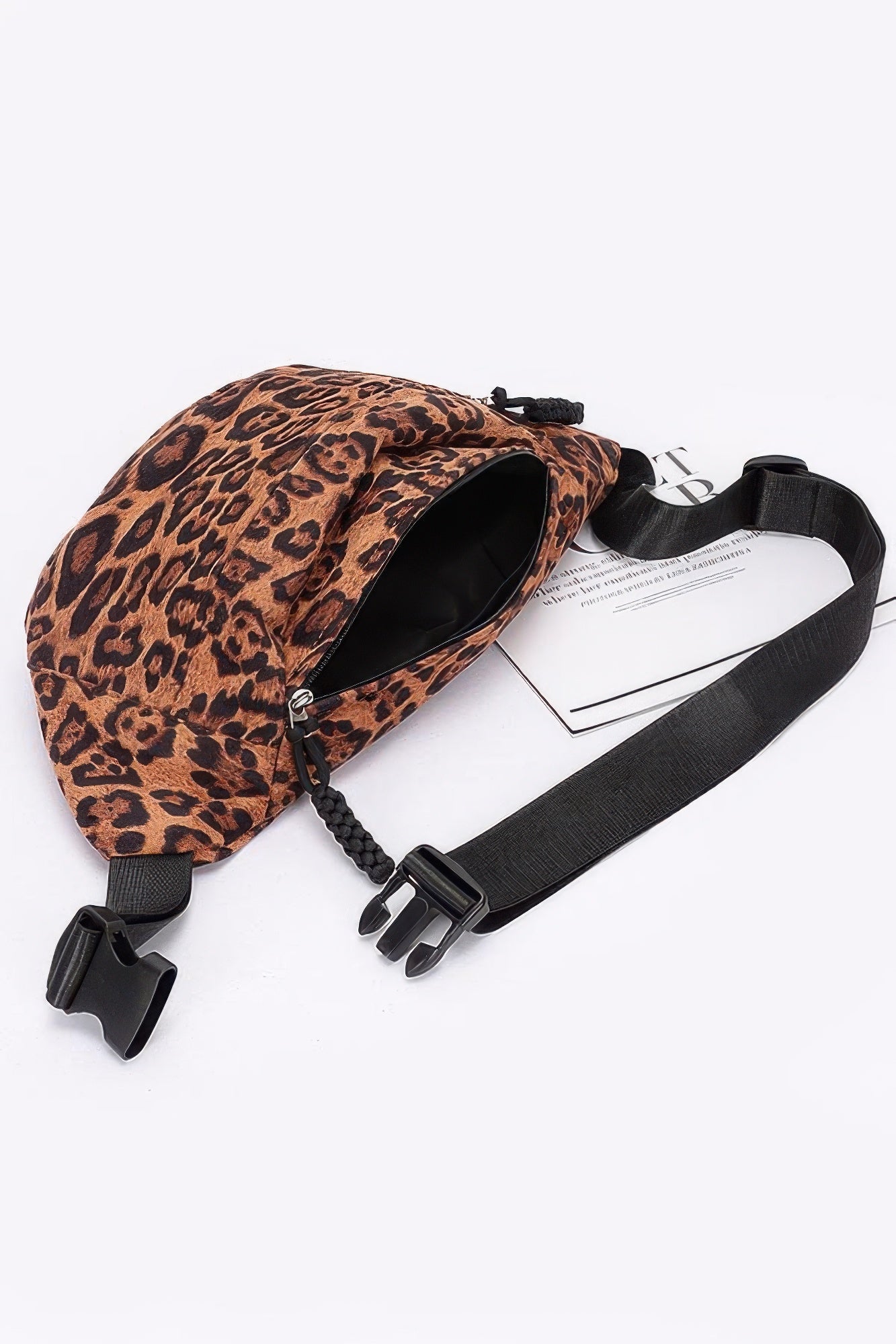 Leopard faux suede sling bag, open zipper top with black interior and adjustable strap