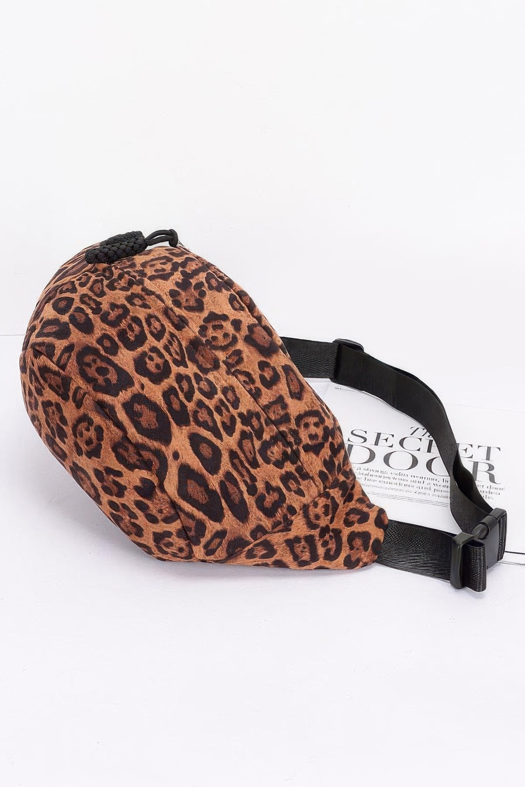 Leopard faux suede crossbody bag with drawstring cord and adjustable shoulder strap