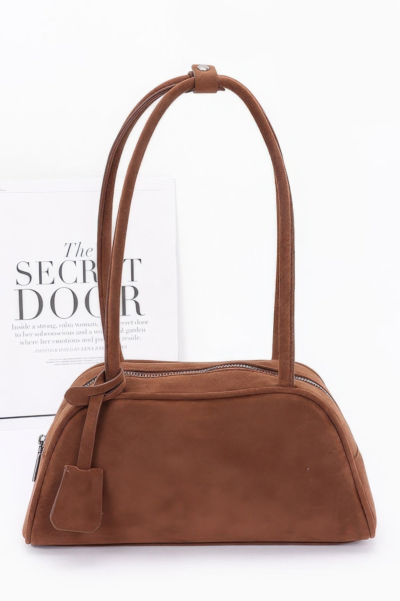 Faux suede sport bag in brown with top handles and front pocket