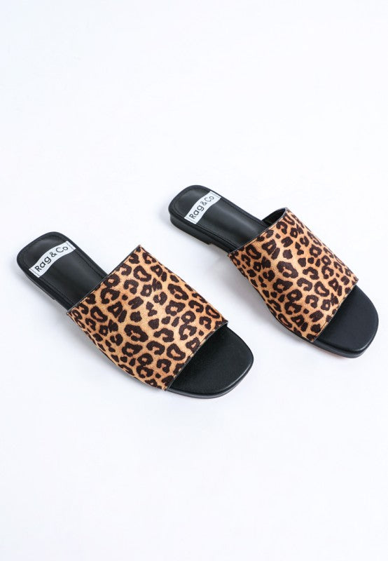 Leopard print slider flats with black open toe and wide front strap