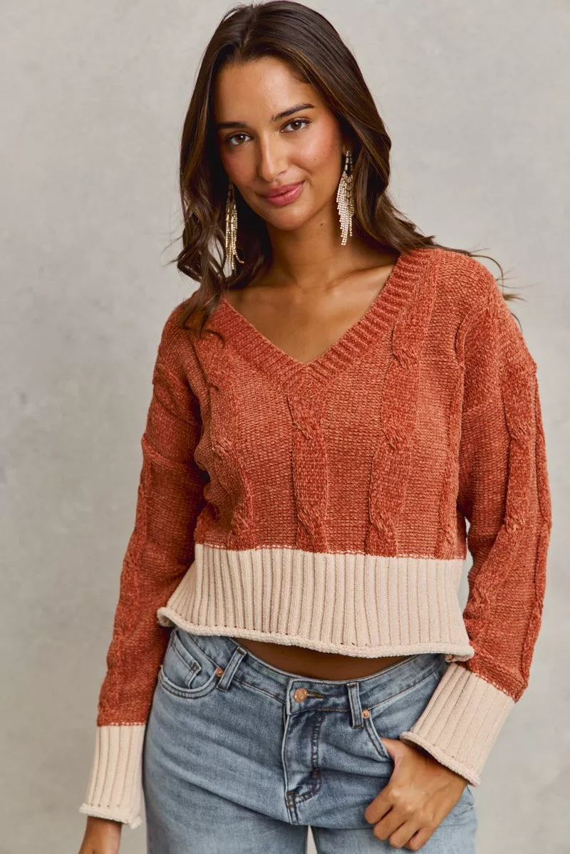 Rust chenille cable-knit V-neck cropped sweater with contrast ribbed hem and cuffs