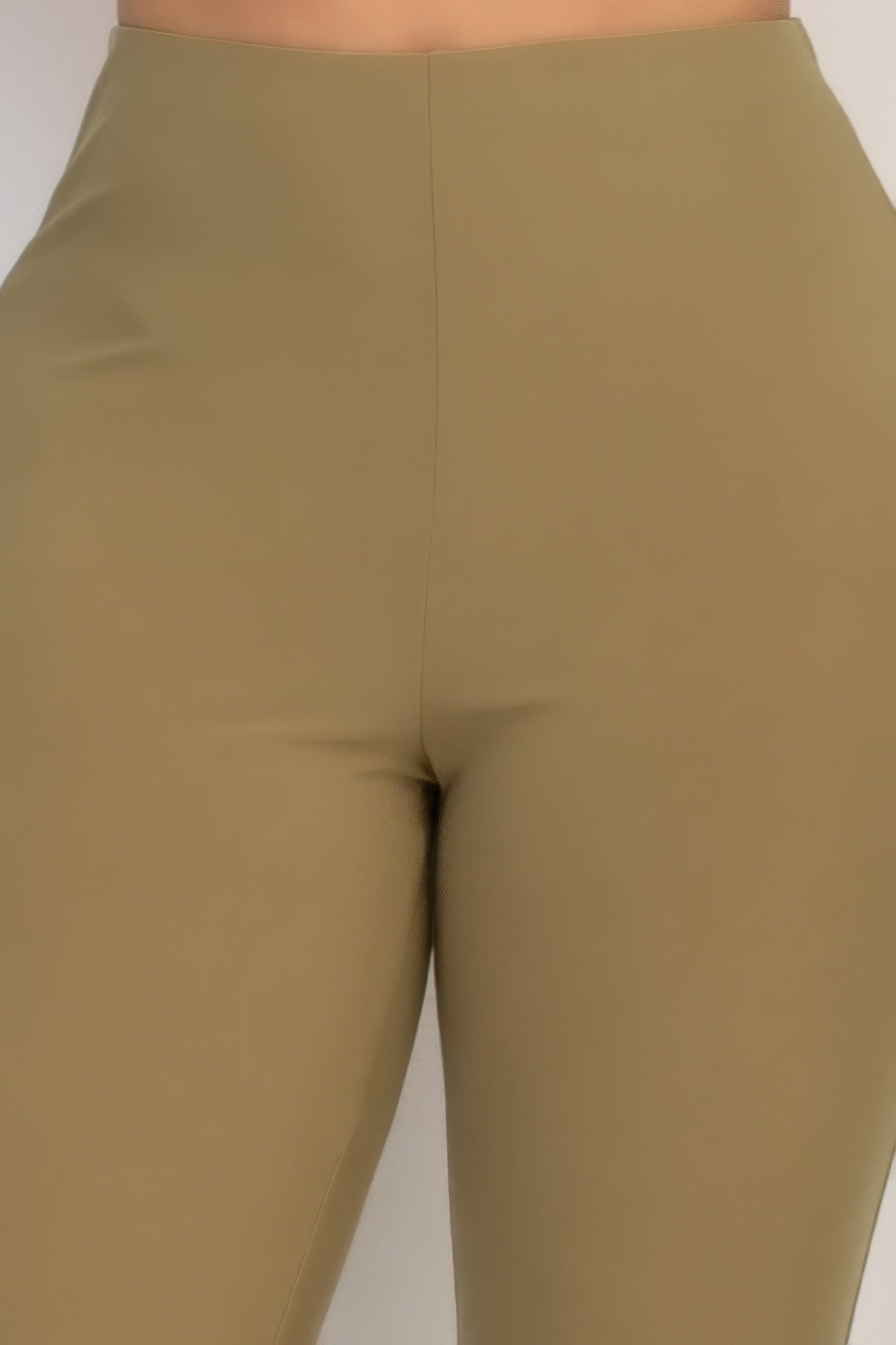 Dark olive fit-and-flare casual pants close-up: smooth waistband and hip fit
