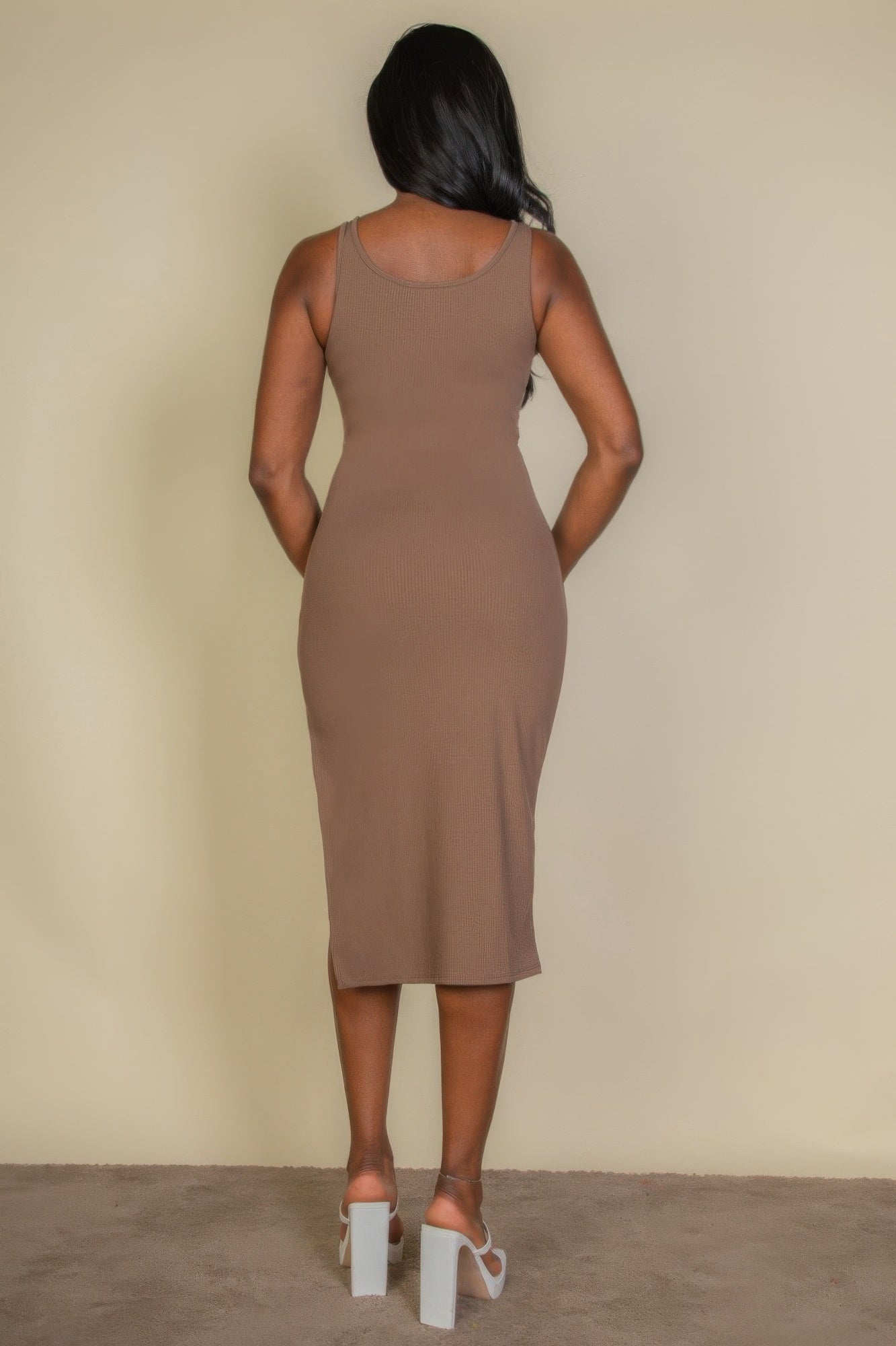 Back view: taupe/brown ribbed sleeveless bodycon midi dress with side slit
