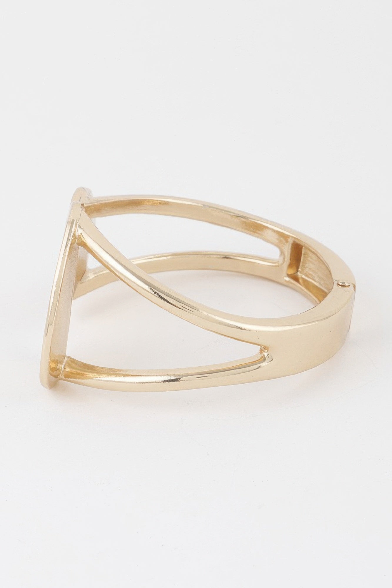 Gold wrap bracelet cuff with open hinge and smooth curved band