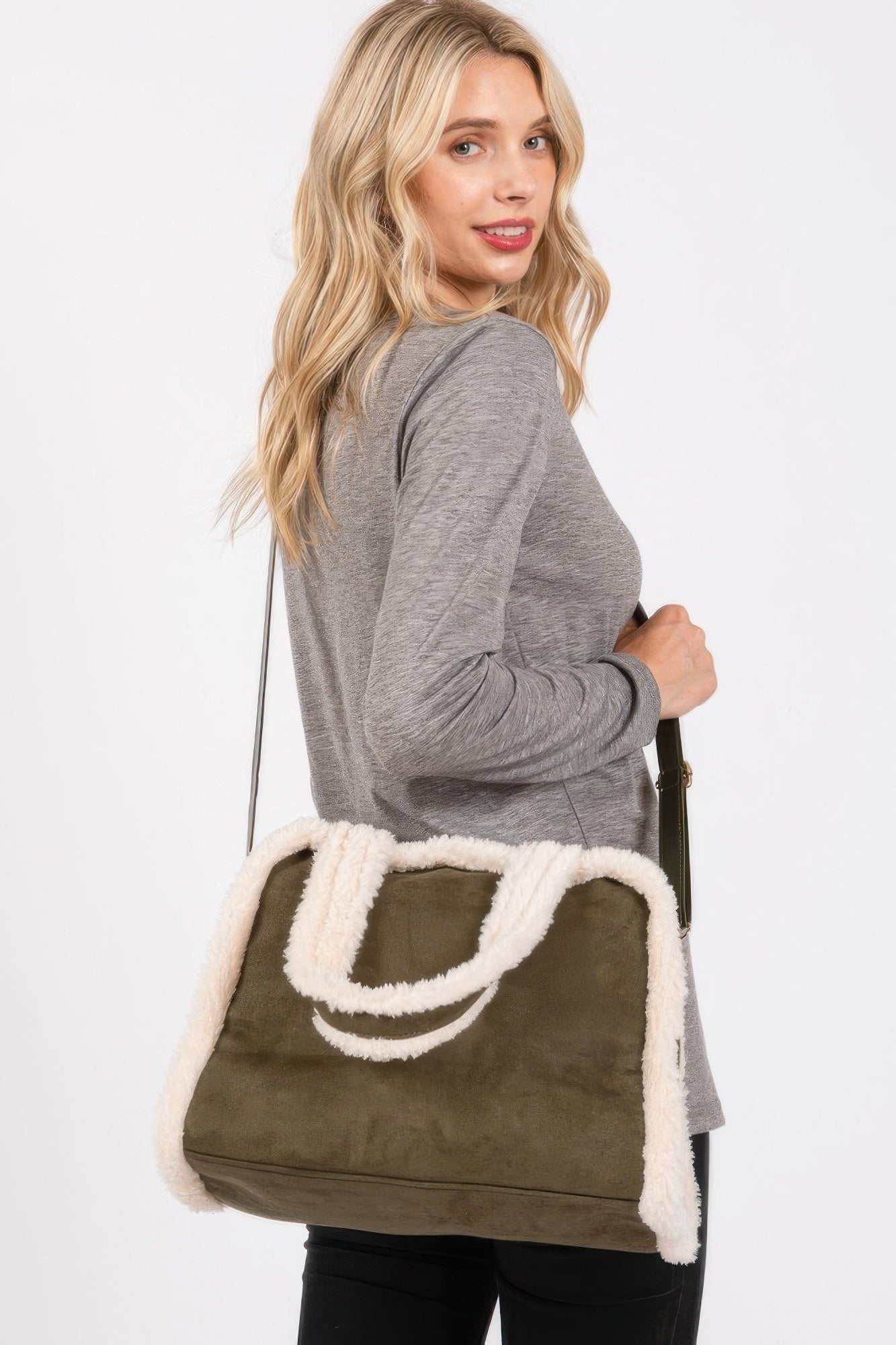 Olive tote and crossbody bag with white fleece trim and curved front stripe