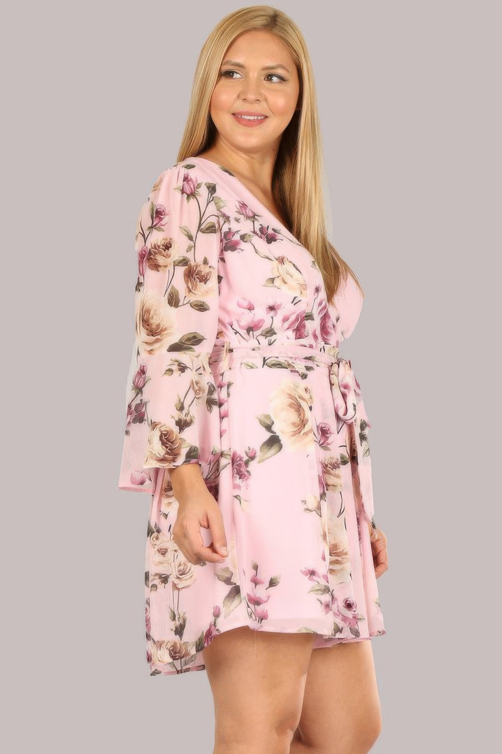 Floral chiffon romper in pink with long tie-belt waist, V-neck and 3/4 sleeves