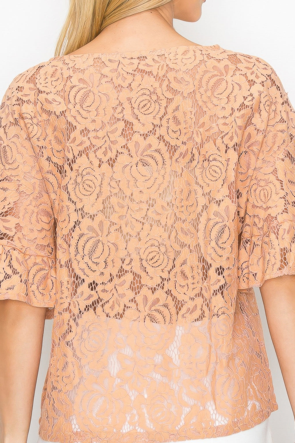 Back view: peach embroidered crochet lace boxy blouse with allover floral pattern